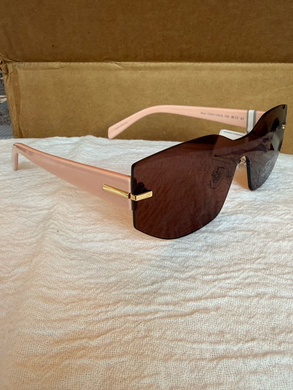 Oscar de la Renta Pink Frame Brown Lens Rimless Sunglasses